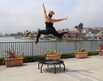 girl jumping on trampoline