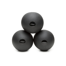 Three JumpSport toning balls stacked